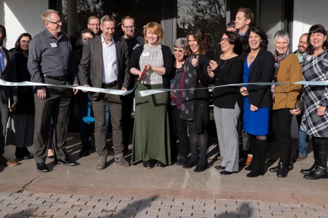 Community partners including Mayor Ted Wheeler and Chair Deborah Kafoury help cut the ribbon to formally open Portland Homeless Family Solutions' Family Village on Dec. 16, 2019.