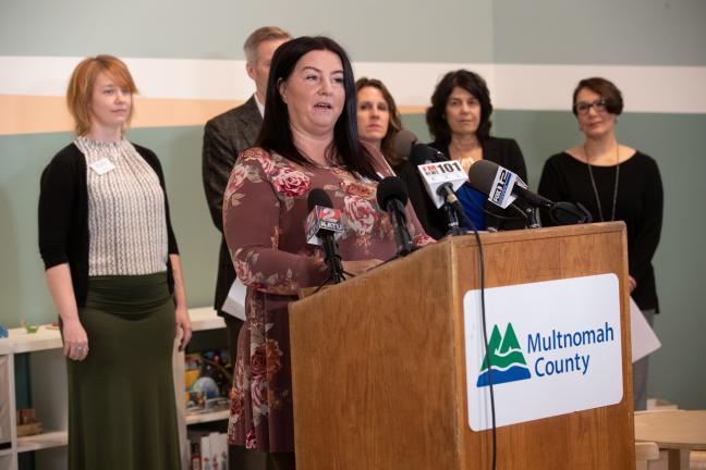 Angi Eagan of Portland Homeless Family Solutions speaks at the opening of the Family Village shelter Dec. 16, 2019..