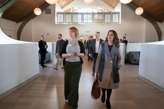 Brandi Tuck of Portland Homeless Family Solutions, left and Chair Deborah Kafoury at the opening of the Family Village shelter Dec. 16, 2019.