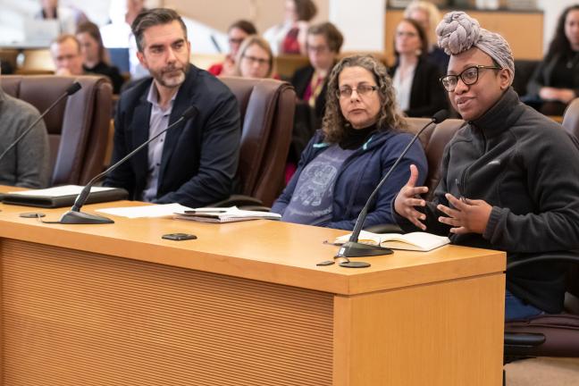 Katrina Holland, right, HereTogether Oregon board member and director of Community Alliance of Tenants, speaks to the board at a briefing Tuesday, Jan. 14, 2020.