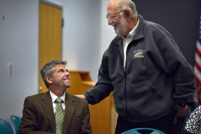 Dr. Paul Lewis, left, chats with Rep. Mitch Greenlick during one of his many trips to Salem.