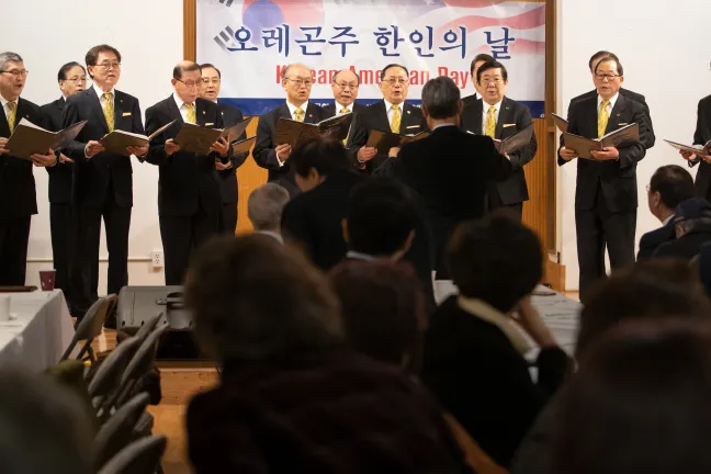 A choir sings at the Korean Society of Oregon's annual celebration.