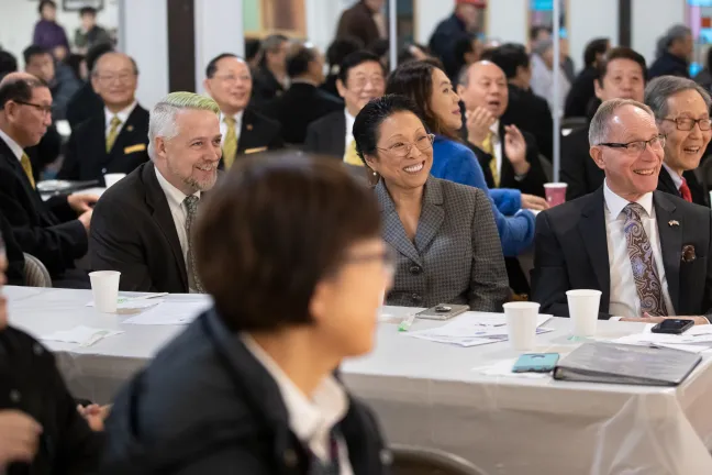Commissioner Stegmann laughs at the Korean Society of Oregon celebration.