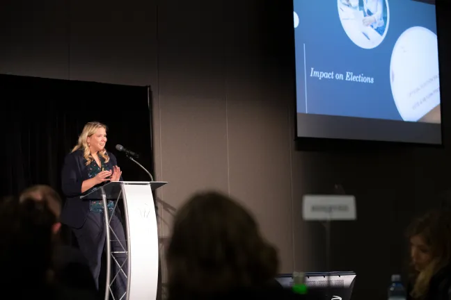 Samantha Korta, a cyber security advisor for Deloitte’s Risk and Financial Advisory practice speaks to guests at 2020 Election and Campaign Security Symposium.