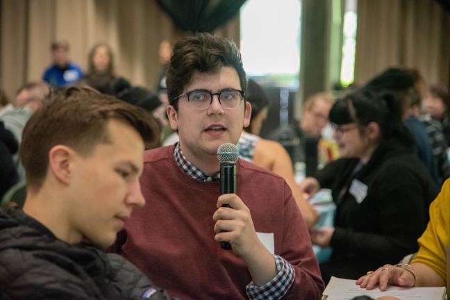 Youth speaking at the summit.