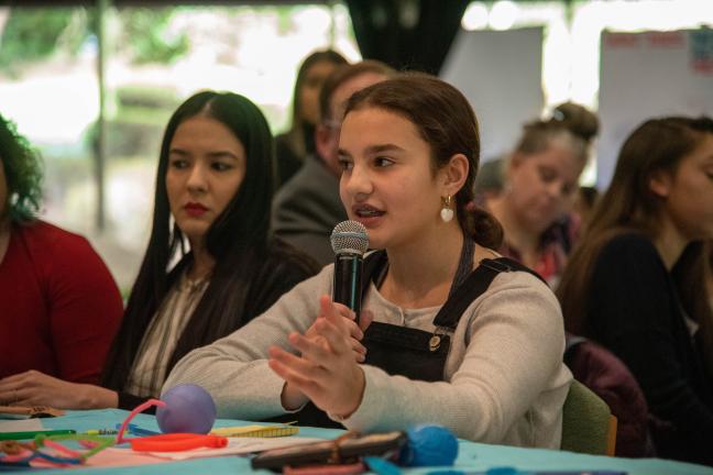 Youth speaking at the summit.