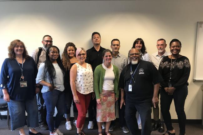 Members of the Department of Community Justice's Safe and Respectful Workplace Workgroup. Photo taken before distancing measures were implemented.