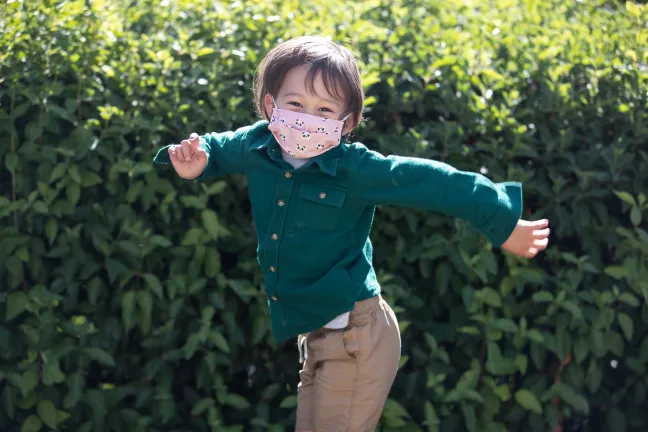 Child wearing mask