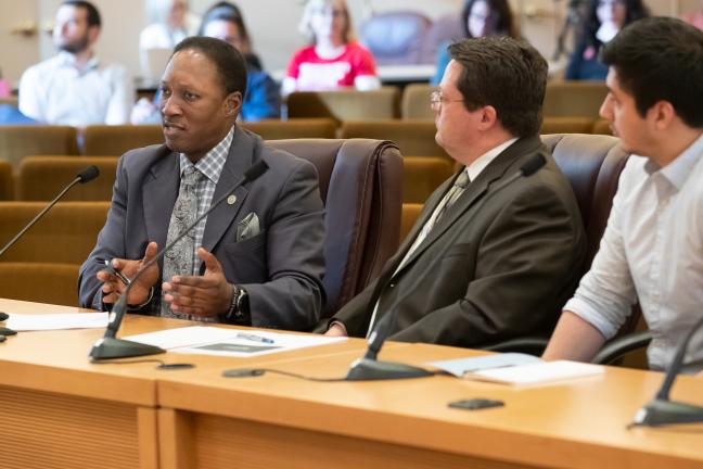 Lee Fleming, left, testifies before the Board prior to the COVID-19 pandemic.