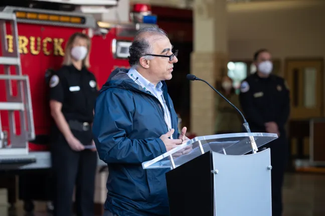 Mohammed Bader, interim director of the Department of County Human Services, began the event with a poem he wrote, reciting it in both Arabic and English.