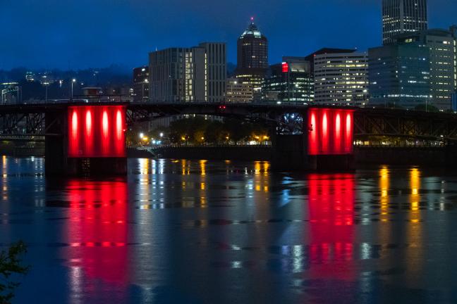 The Morrison Bridge is lit red to honor missing and murdered indigenous women and girls, May 2021