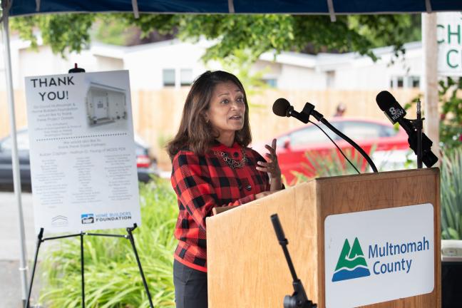 Commissioner Susheela Jayapal speaks during a ceremony to thank supporters of the St. Johns Village on May 21, 2021.