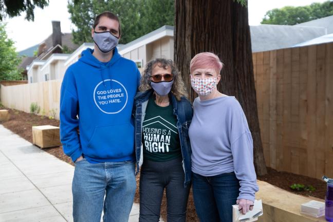 Sheila Mason of the St. Johns Welcomes the Village Coalition, right, poses with Pastors David Libby, left, and Janel Hovde, center, from St. Johns Church.