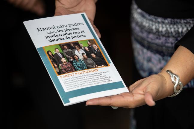 The parent handbook — produced in English and Spanish — provides a glossary of common justice terms, tips for court appearances and important contacts for parents.