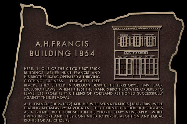 Historic plaque on Morrison Bridge honors one of Oregon's first African American businesses.