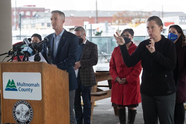 Mayor Ted Wheeler speaks at a media event on a $38 million Portland/Multnomah County homelessness package on Nov. 1, 2021.