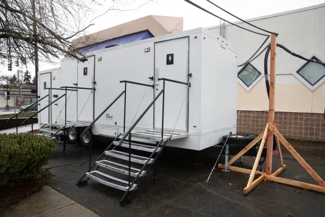 A shower trailer in the exterior portion of the Arbor Lodge Winter Shelter, hours before it opens Nov. 19, 2021.