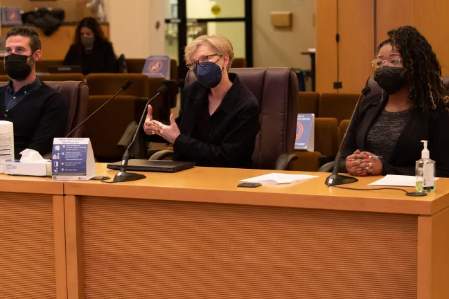 Julie Dodge, interim director of the Behavioral Health Division, center, details how the Measure 110 funds would be spent