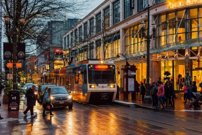 Photo courtesy TriMet, shows a Max train in downtown Portland.