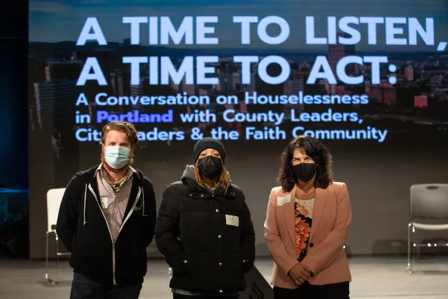 Commissioner Sharon Meieran, right, with staff from Cultivate Initiatives after the "A Time to Listen, A Time to Act" faith forum Friday, Feb. 18, 2022.