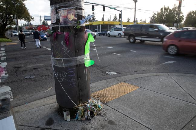 Memorial at the intersection of 122nd and Stark, where a driver hit and killed  a woman in July, 2020