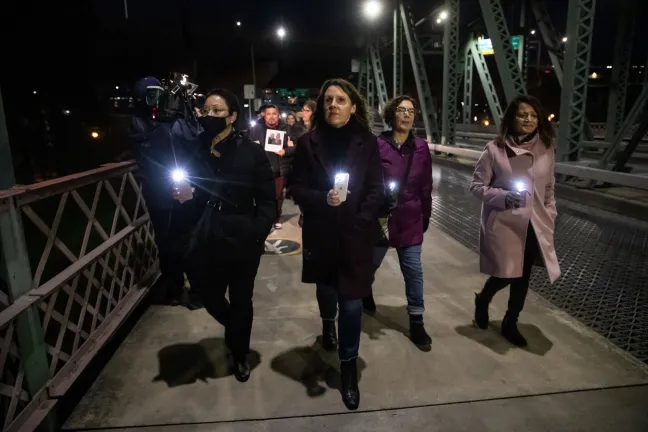Chair Deborah Kafoury, center, walks with Commissioners Lori Stegmann, Jessica Vega Pederson and Susheela Jayapal at the COVID remembrance.an,