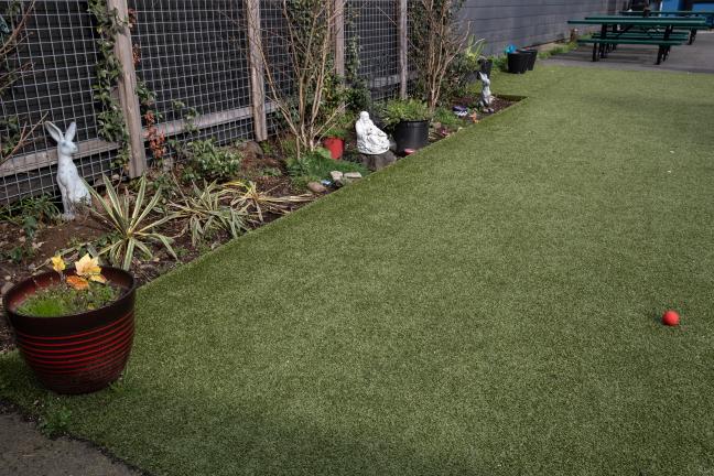 The dog run and part of the garden area at the Laurelwood Center shelter on Friday, March 11, 2022.