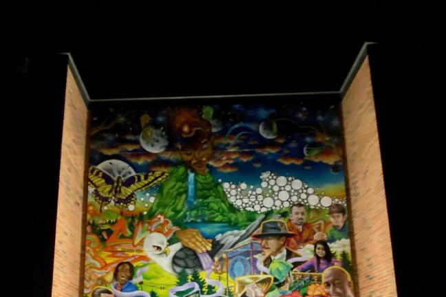 The 28-by-20-foot mural features elements of nature: a colorful waterfall, a butterfly and flowers. It features prominent Portland-area landmarks and, above all, people and families who helped inform the mural’s theme of restorative justice. 