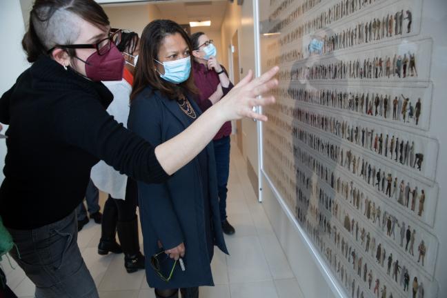 Commissioner Jayapal reviews art at the new Central Courthouse.