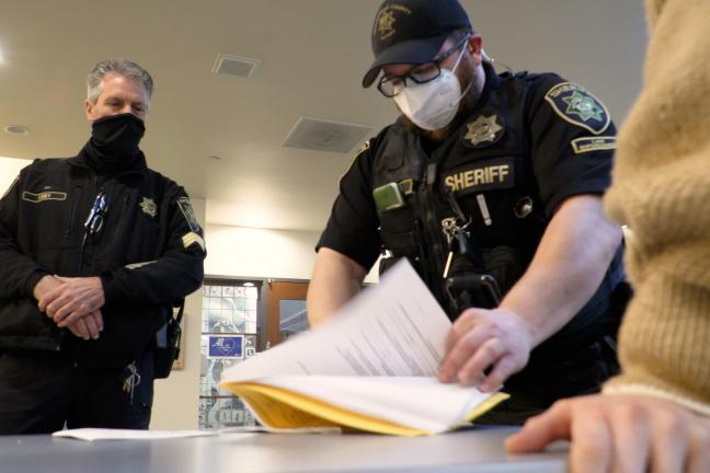 Sergeant Gary Kirby (left) and other MCSO officers play a critical role in DVERT: Multnomah County’s Domestic Violence Enhanced Response Team.