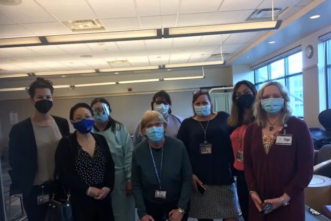 Commissioner Stegmann with East County Health Center health providers and administrators.