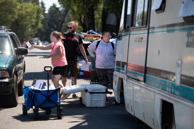 utreach team at Cascadia handing out cooling kits during record-setting heat in June, 2021