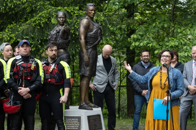 Commissioner Jessica Vega Pederson speaks at an AMR rescue team celebration May 27.