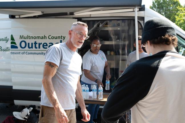 John McVay, community justice manager with the Department of Community Justice, helps with outreach during the July 2022 heatwave