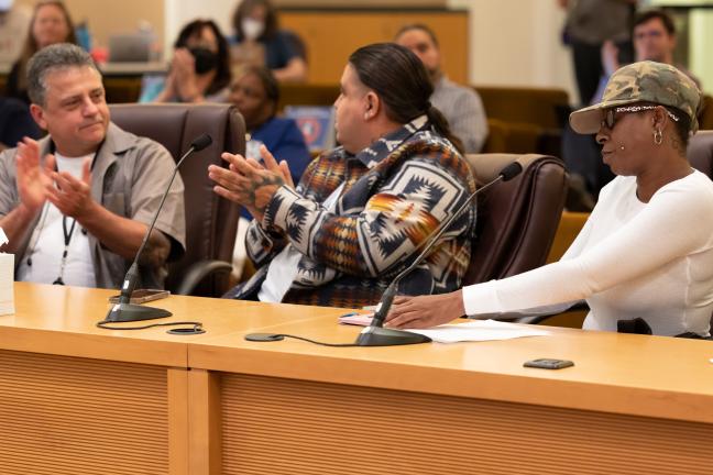 (Left to right): Mario Cardenas, Jerrod Murray, and Coretta King testify before the Board of Commissioners
