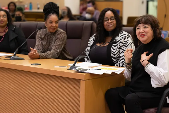 (Left to right): Ebonee Bell, Bahia Overton, Shannon Olive, and Mary Li brief the Board on the Multnomah Mothers Trust Project