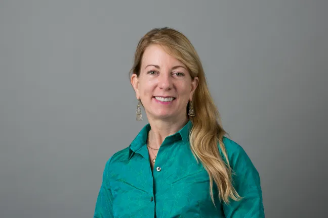Photo of Multnomah County Health Department deputy director of finance Wendy Lear wearing teal top.