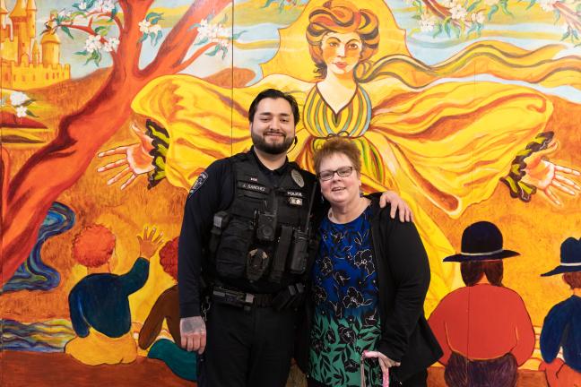 Justus Sanchez (left) took time to visit his old juvenile court counselor, Candace Johnson, who he credits with changing his life and putting him on his career path. 