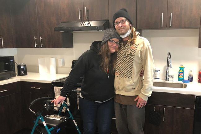 Gwyn and Daniel in their apartment