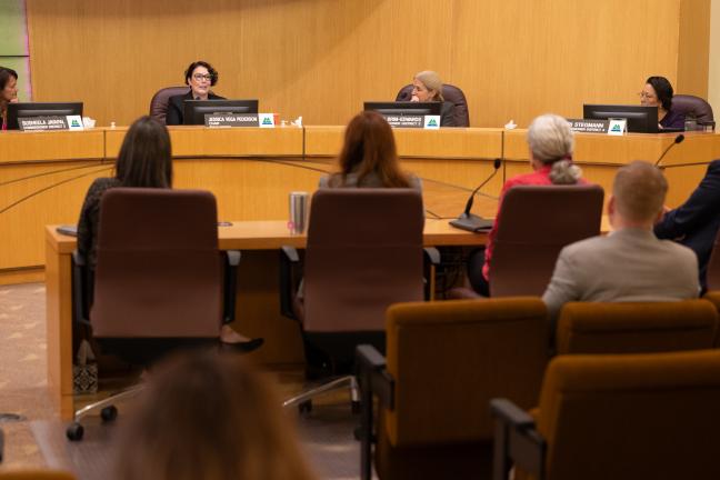 Susheela Jayapal, Jessica Vega Pederson, Julia Brim-Edwards and Lori Stegmann at the dais in the boardroom.