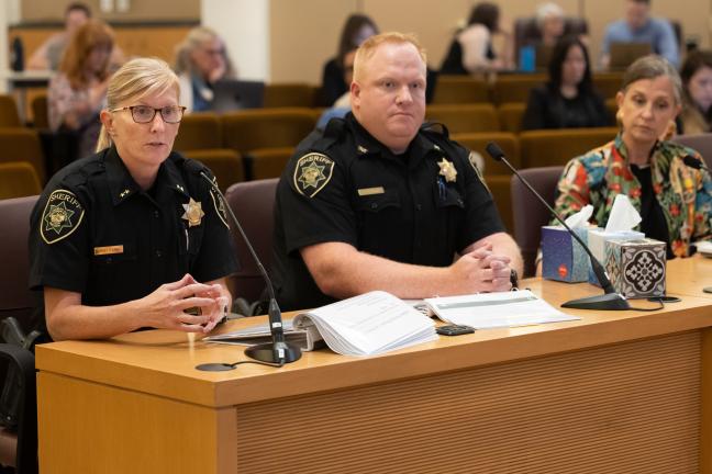 Sheriff Nicole Morrisey O’Donnell Stephen Reardon, Chief Deputy of Corrections for the Sheriff’s Office and Abbey Stamp, executive director of the Local Public Safety Coordinating Council speak before the board.