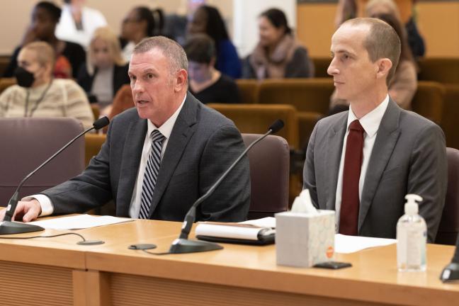 Multnomah County Elections Director Tim Scott (left) and Dan Eisenbeis, a Department of Community Services project manager.