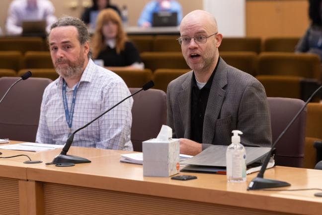 Chris Voss, director of County Emergency Management, and Dave Lentzer, interim planning division chief, speak to the Board of County Commissioners