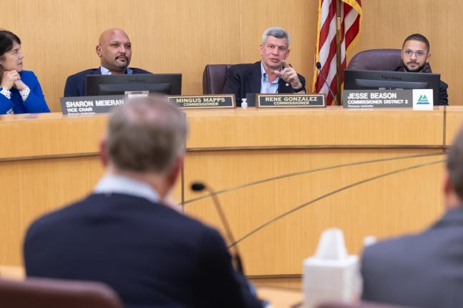 Sharon Meieran, Mingus Mapps, Rene Gonzalez and Jesse Beason sit at the dais.