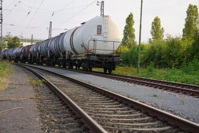 Trains carrying oil move along the rail road