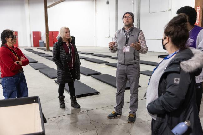 Health Officer Dr. Richard Bruno training volunteers to administer Naloxone at a severe weather shelter