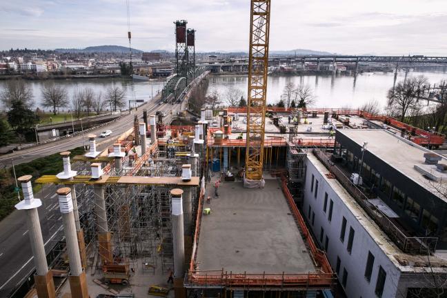 Lobby columns take shape at left as new central courthouse rises by Hawthorne Bridge