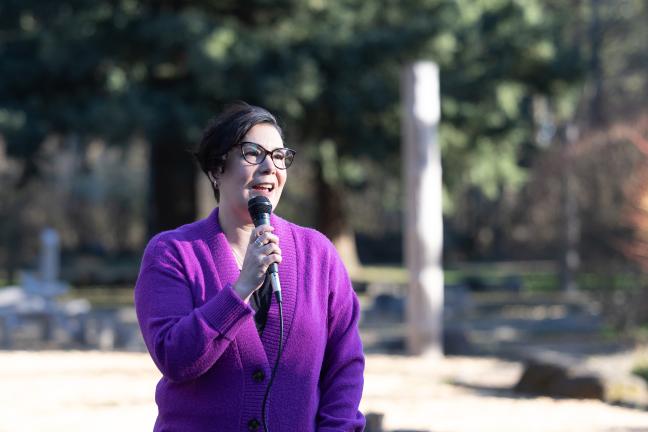 Chair Vega Pederson speaking at a park