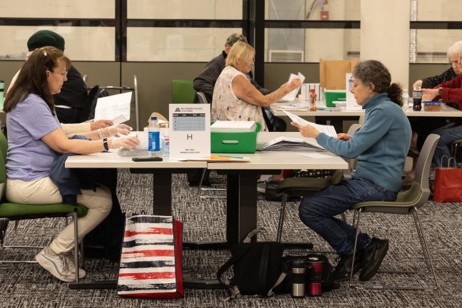 Teams of bipartisan volunteers at Multnomah County Elections sort ballots before they are counted Tuesday, May 21, 2024.