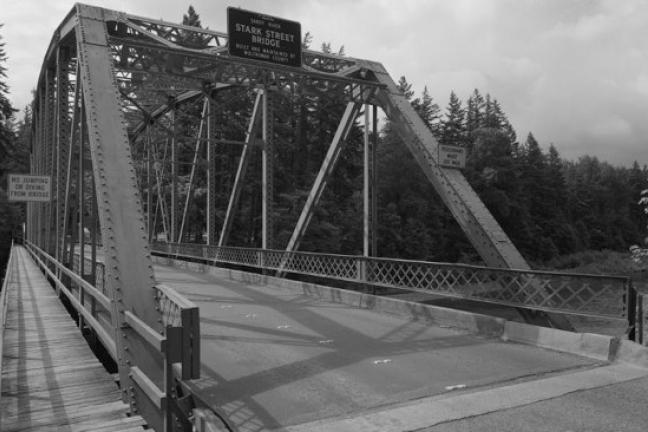 black and white photo of the steel truss of the Stark Street bridge as it looked around 1968